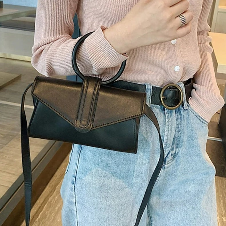 Sac à poignée ronde porté à la main