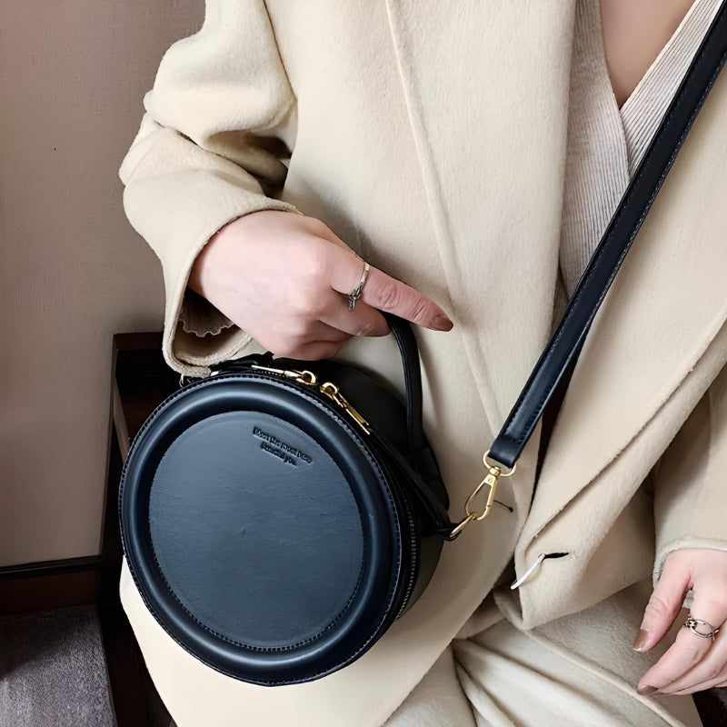 Sac à porter à main rond et original