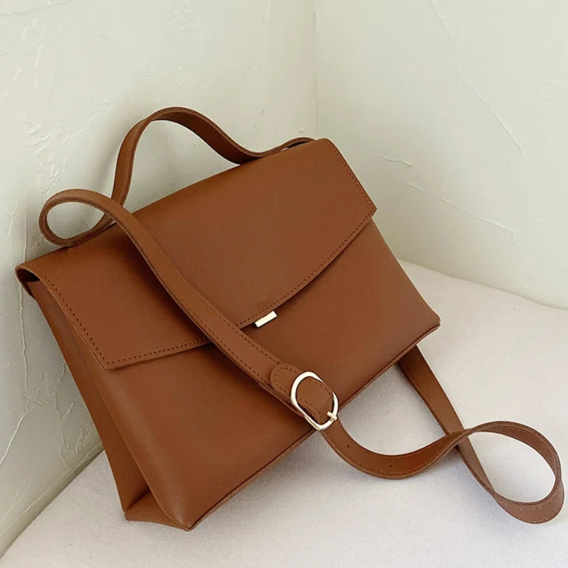 Sac à porter par la poignée ou en bandoulière