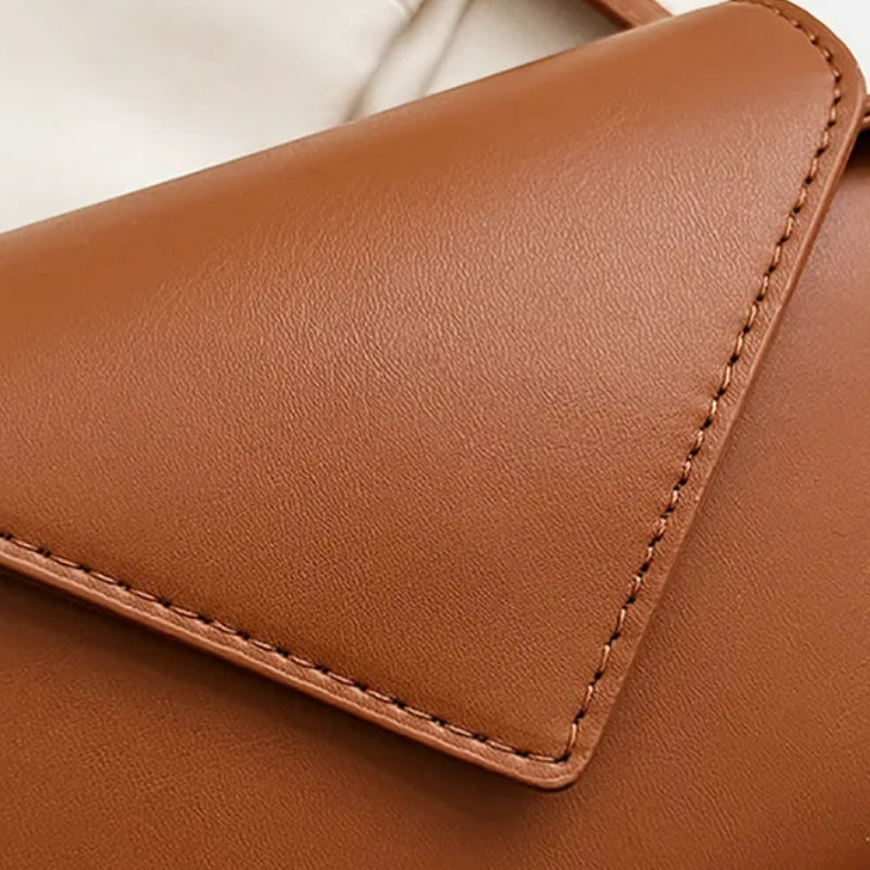 Sac au format ovale avec bandoulière