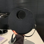 Sac au format rond d'aspect crocodile