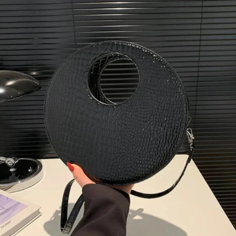 Sac au format rond d'aspect crocodile