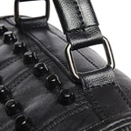 Sac avec bandoulière et détails cloutés