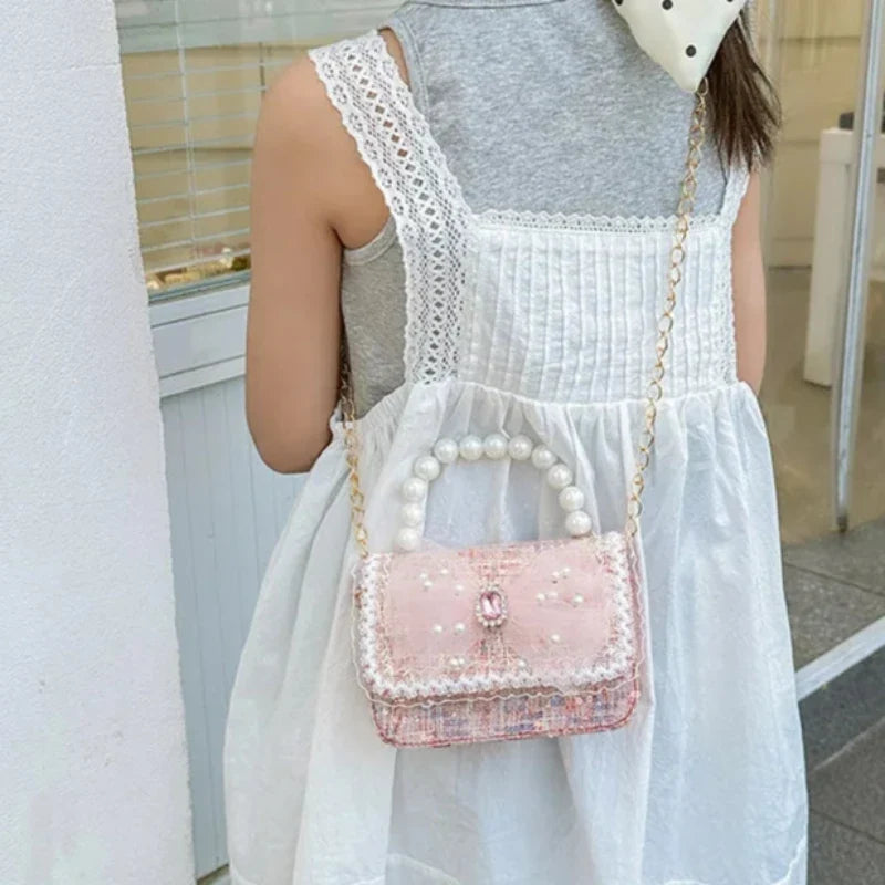 Sac avec paillettes et perles pour petite fille