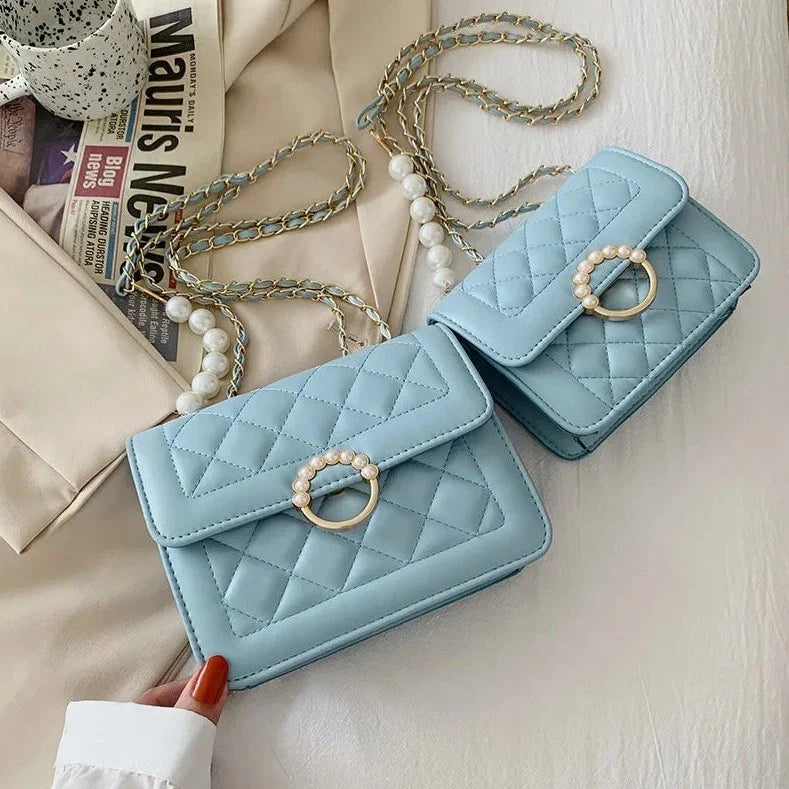 Sac avec perles et matelassage à porter à la main