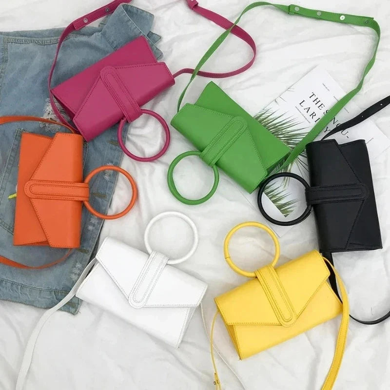 Sac avec poignée circulaire à porter à la main