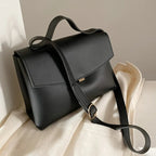 Sac avec poignée de main et sangle bandoulière
