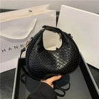 Sac baguette à motif tressé et allure élégante