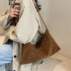 Sac baguette à porter main au design chic et épuré