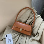 Sac baguette épuré à élégant fermoir couleur or