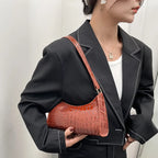 Sac baguette matelassé au style luxueux