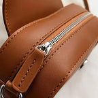 Sac bandoulière à silhouette ovale