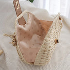 Sac bandoulière en paille tressée beige
