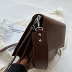 Sac bandoulière noir à porter à la main