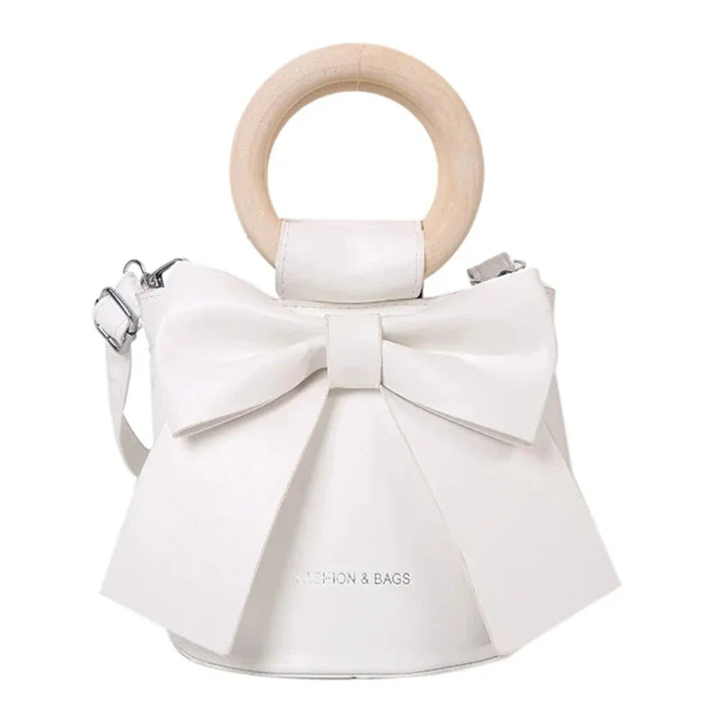Sac bourse féminin chic avec nœud papillon