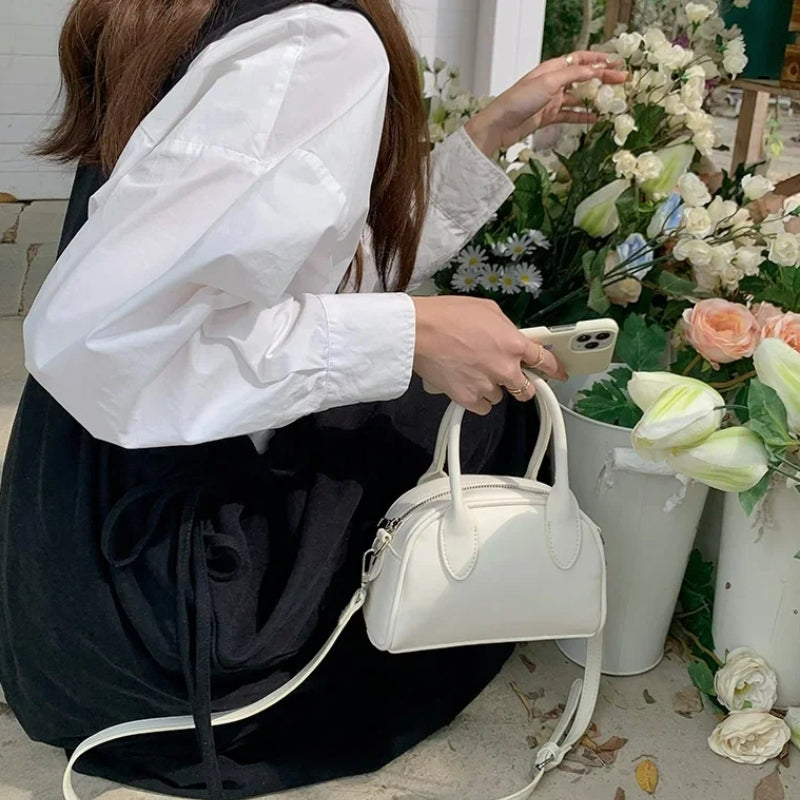 Sac bowling compact à main pour femme
