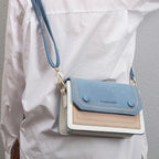 Sac cartable à bandoulière en deux couleurs