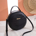 Sac chic à main au format rond