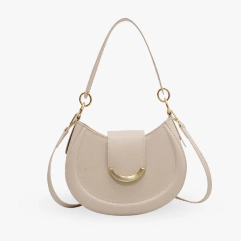 Sac compact à main destiné aux femmes