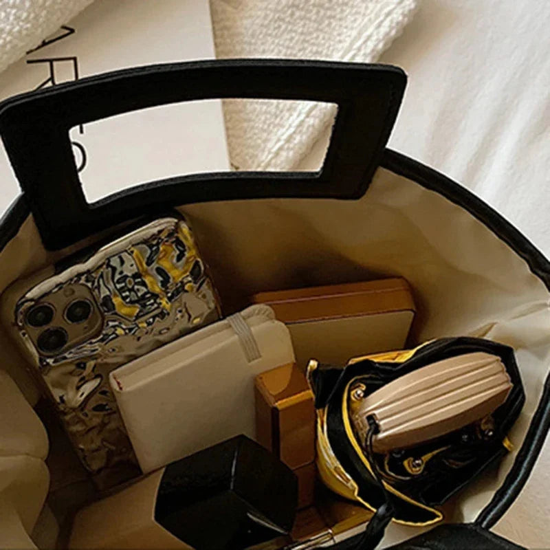 Sac contemporain tissé au look chic
