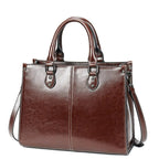 Sac de couleur marron en cuir à main