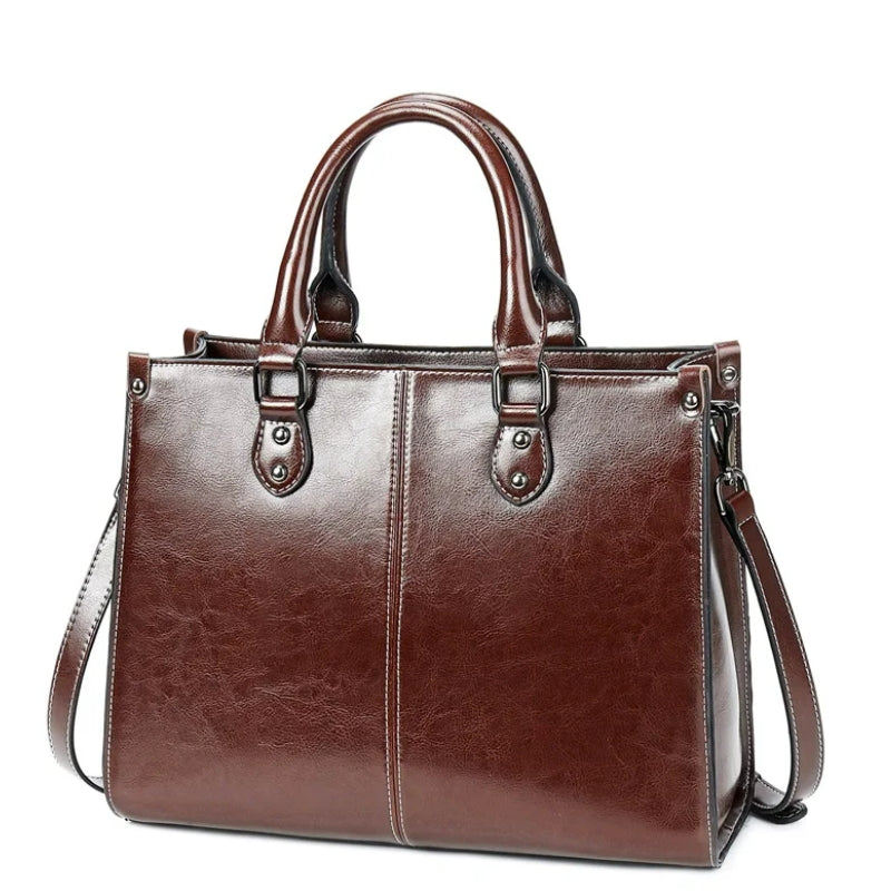 Sac de couleur marron en cuir à main