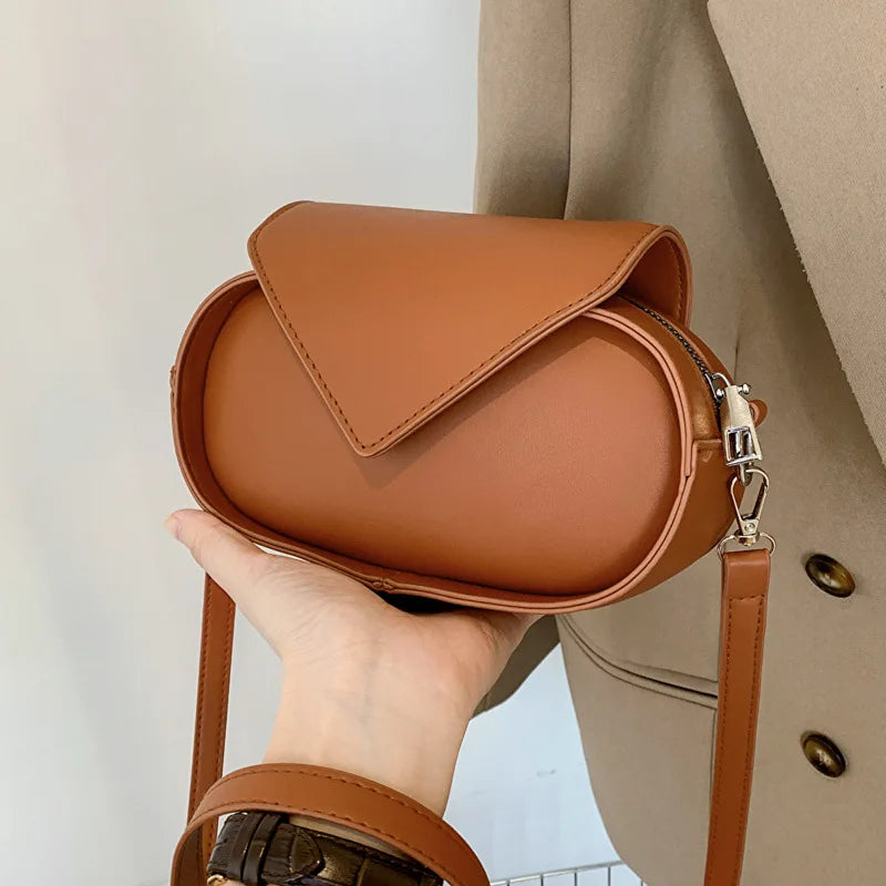 Sac de forme ovale muni d’une bandoulière