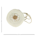 Sac de forme ronde en paille orné d’une fleur