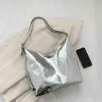Sac de luxe brillant aux reflets argentés