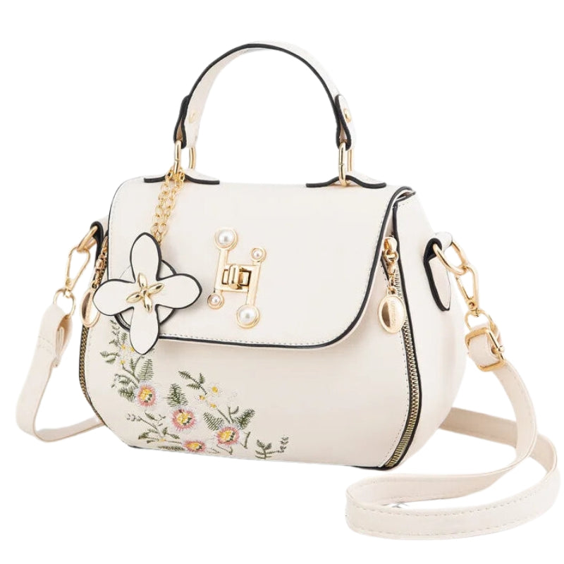 Sac décoré de broderies à porter à main