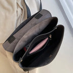 Sac doté d’une poignée et d’une bandoulière