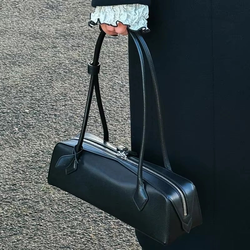 Sac élégant format baguette doté d'une anse chic