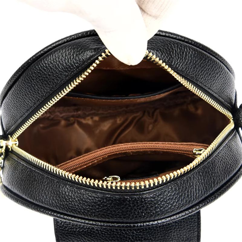 Sac en cuir effet croco de forme ronde à main
