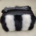 Sac en fourrure luxueux porté main