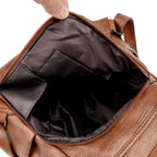 Sac en simili marron vintage pour femme main et dos