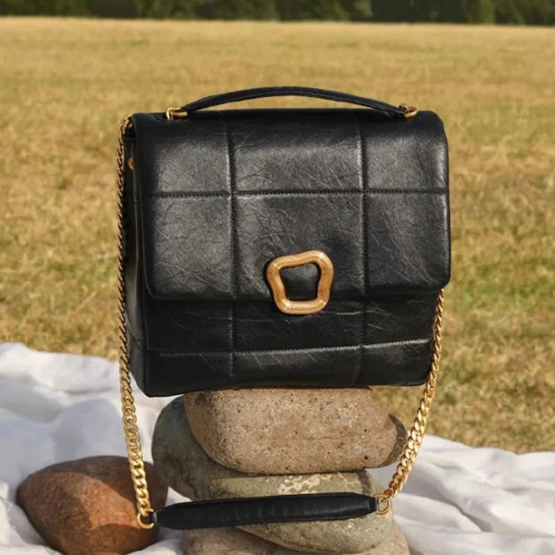 Sac façon mallette au matelassage noir