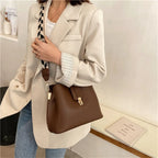 Sac féminin à large bandoulière