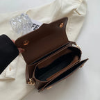 Sac féminin à main forme baguette