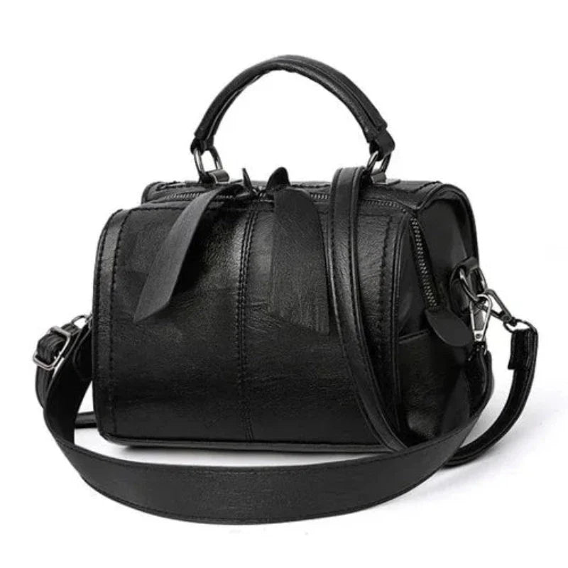 Sac féminin à main style bowling