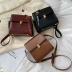 Sac féminin bandoulière de type cartable