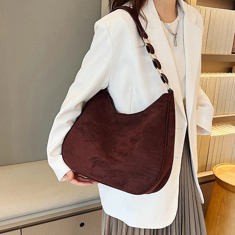 Sac féminin élégant en simili avec bandoulière