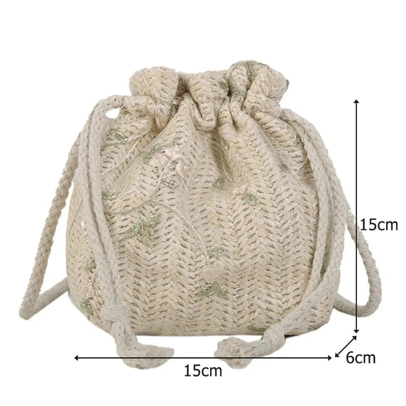 Sac féminin en forme de bourse à fleurs brodées