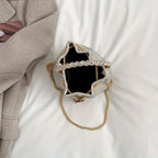 Sac féminin façon bourse luxueuse avec strass
