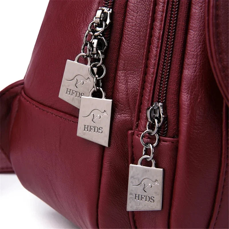 Sac féminin multipoches rouge en simili pour main et dos