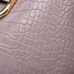 Sac féminin porté main avec portefeuille assorti
