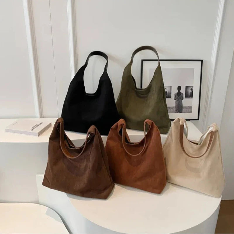 Sac féminin souple porté main