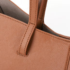 Sac femme à main conçu pour les cours