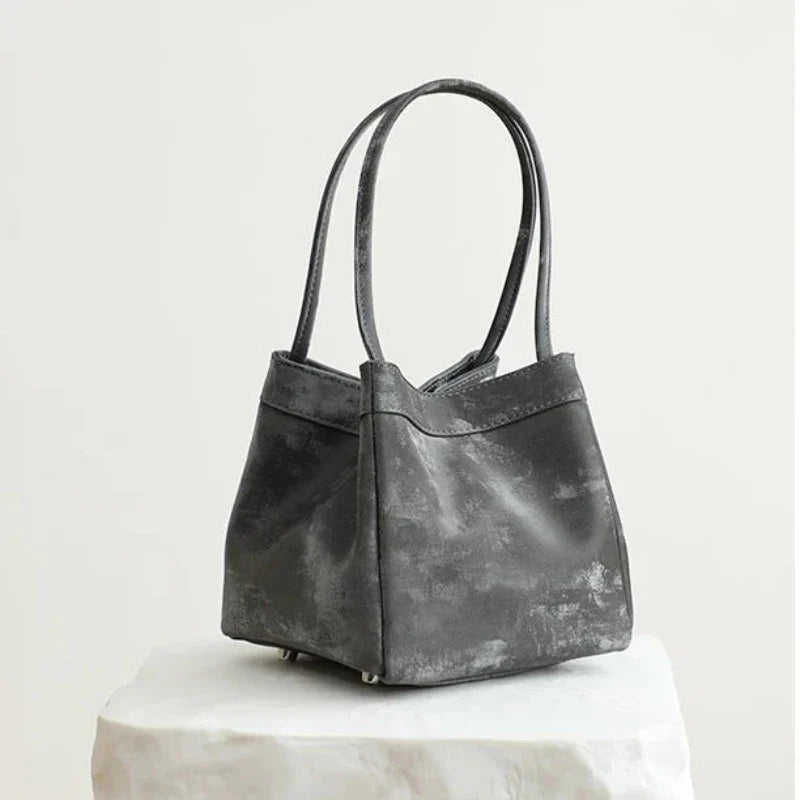 Sac femme au format carré et seau