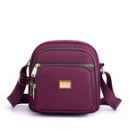 Sac femme avec bandoulière doté de nombreuses poches