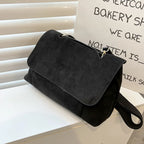 Sac femme avec rabat porté bandoulière